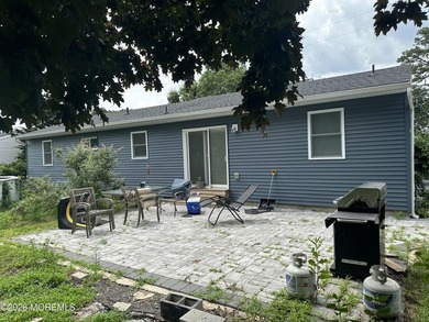 Totally renovated 2023. Open kitchen/living room floor plan with - photo 18