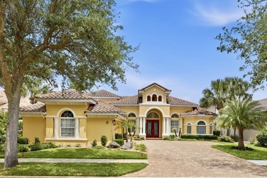 Welcome to this exceptional waterfront estate located in the - photo 1
