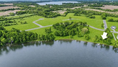A rare opportunity to find west-facing sandy lakeshore less than - photo 3