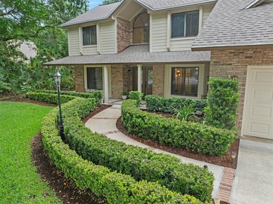 Custom-Built Brick Beauty in Breakaway Trails! Tucked away on a - photo 2