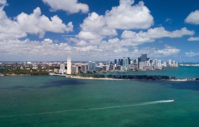 This brand-new 5-bedroom, 6.5-bath bayfront residence at UNA