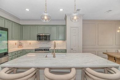 Welcome to this exceptional 3-bedroom, 4-bath mixed-use townhome - photo 9