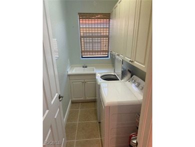 This premier fountain view, private elevator, spacious two-car