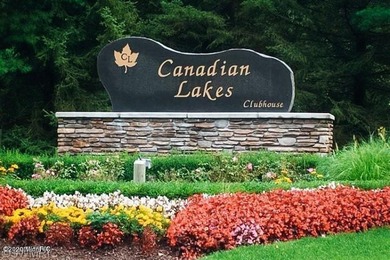 Positioned just across the road from the serene shores of Lake - photo 4