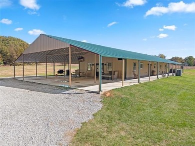 Private 3-bedroom, 2-bath metal home on 40 wooded acres in - photo 1