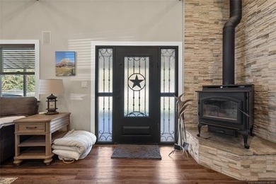 Private 3-bedroom, 2-bath metal home on 40 wooded acres in - photo 4