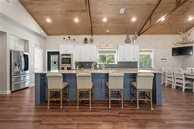 Private 3-bedroom, 2-bath metal home on 40 wooded acres in - photo 7