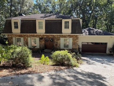 Lake Home For Sale in Johns Creek, Georgia