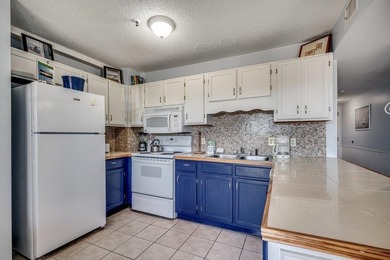 Enjoy the ultimate convenience of this first-floor condo in - photo 10