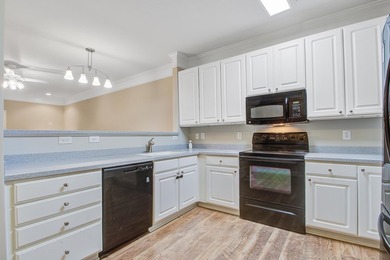 Beautifully maintained second floor, end unit condo, offering - photo 6