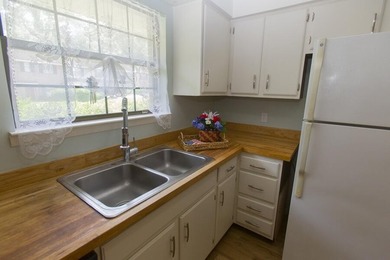 Cute and comfy. Downstairs has Living/Dining and patio . Kitchen - photo 3