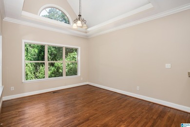 Private lake living at its finest! Tucked away on a wooded lot - photo 15