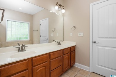 Private lake living at its finest! Tucked away on a wooded lot - photo 20