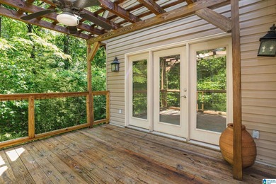 Private lake living at its finest! Tucked away on a wooded lot - photo 24