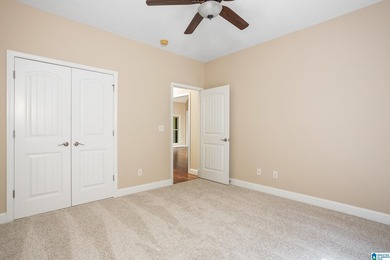Private lake living at its finest! Tucked away on a wooded lot - photo 25