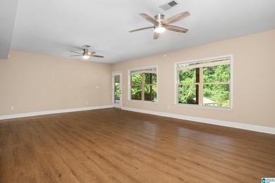 Private lake living at its finest! Tucked away on a wooded lot - photo 30