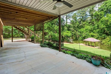 Private lake living at its finest! Tucked away on a wooded lot - photo 37