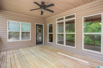 Private lake living at its finest! Tucked away on a wooded lot - photo 40