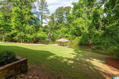 Private lake living at its finest! Tucked away on a wooded lot - photo 41