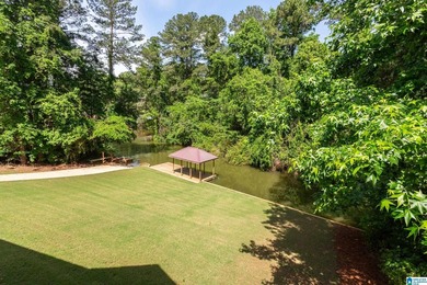 Private lake living at its finest! Tucked away on a wooded lot - photo 43