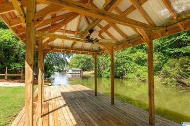 Private lake living at its finest! Tucked away on a wooded lot - photo 45