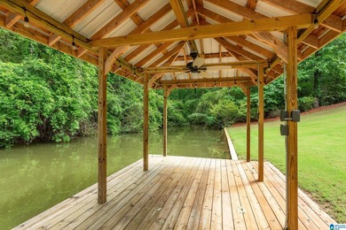 Private lake living at its finest! Tucked away on a wooded lot - photo 46