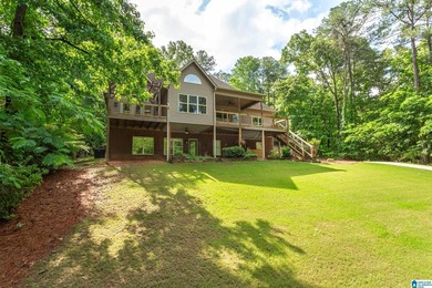 Private lake living at its finest! Tucked away on a wooded lot - photo 47