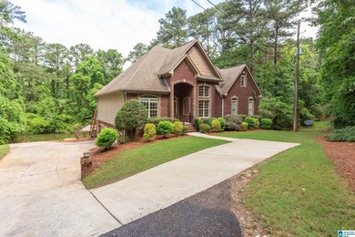 Private lake living at its finest! Tucked away on a wooded lot - photo 48