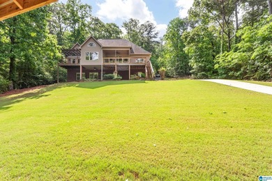Private lake living at its finest! Tucked away on a wooded lot - photo 49