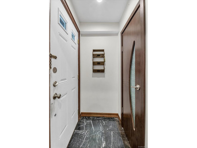 Step into this stunning fully renovated attached brick one - photo 2