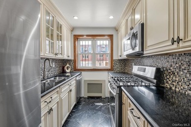 Step into this stunning fully renovated attached brick one - photo 8