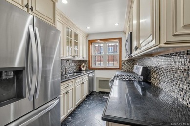 Step into this stunning fully renovated attached brick one - photo 9