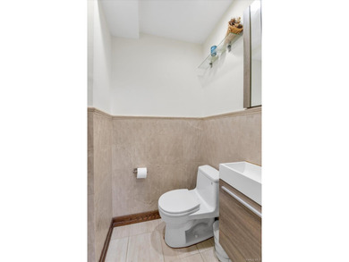 Step into this stunning fully renovated attached brick one - photo 10