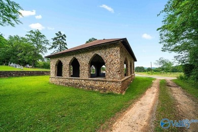 Tucked away on 7 beautiful wooded acres, this private retreat - photo 3