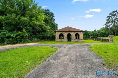 Tucked away on 7 beautiful wooded acres, this private retreat - photo 4