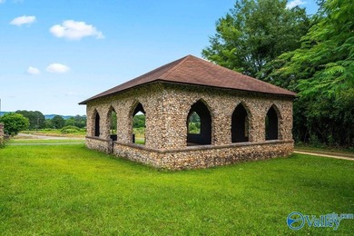 Tucked away on 7 beautiful wooded acres, this private retreat - photo 5