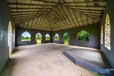 Tucked away on 7 beautiful wooded acres, this private retreat - photo 6