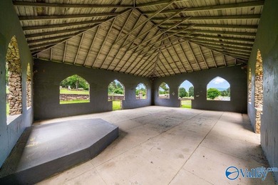 Tucked away on 7 beautiful wooded acres, this private retreat - photo 7