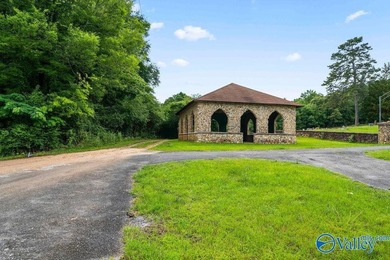 Tucked away on 7 beautiful wooded acres, this private retreat - photo 9