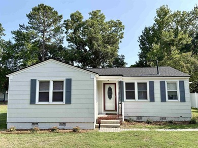 This charming 3-bedroom, 1-bath home is nestled in the desirable - photo 1
