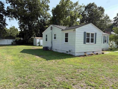 This charming 3-bedroom, 1-bath home is nestled in the desirable - photo 3