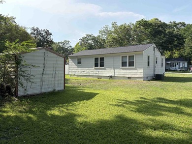 This charming 3-bedroom, 1-bath home is nestled in the desirable - photo 4