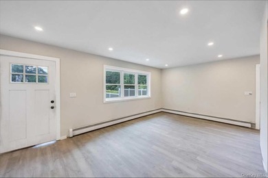 Completely renovated in 2026, with new range hood and bathroom - photo 4