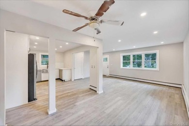 Completely renovated in 2026, with new range hood and bathroom - photo 8