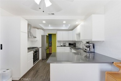 Nestled in a quiet cul-de-sac, this highly desirable front unit - photo 11