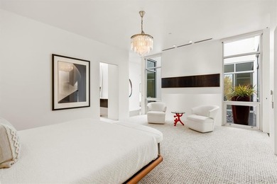 Welcome to Art House Unit 3C, a top-floor, luxury condo designed