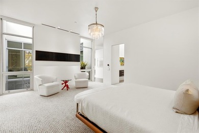 Welcome to Art House Unit 3C, a top-floor, luxury condo designed