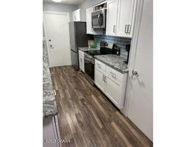 This home is 3 bedroom 2 bathrooms with a 2 car Garage in Summer - photo 3