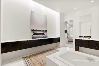 Welcome to Art House Unit 3C, a top-floor, luxury condo designed