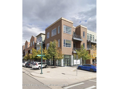 Beautiful 2nd story condo in the Market Street Lofts is the